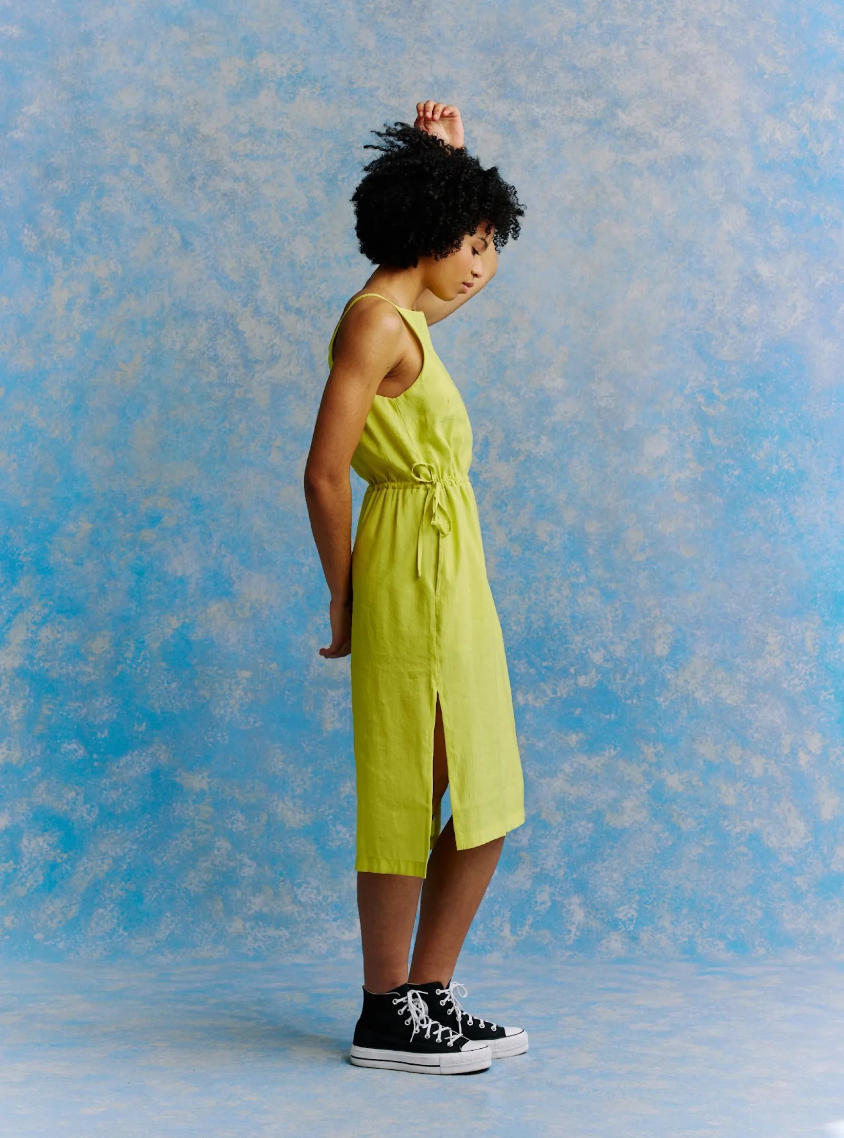 Model wearing the lime coloured Ivy dress